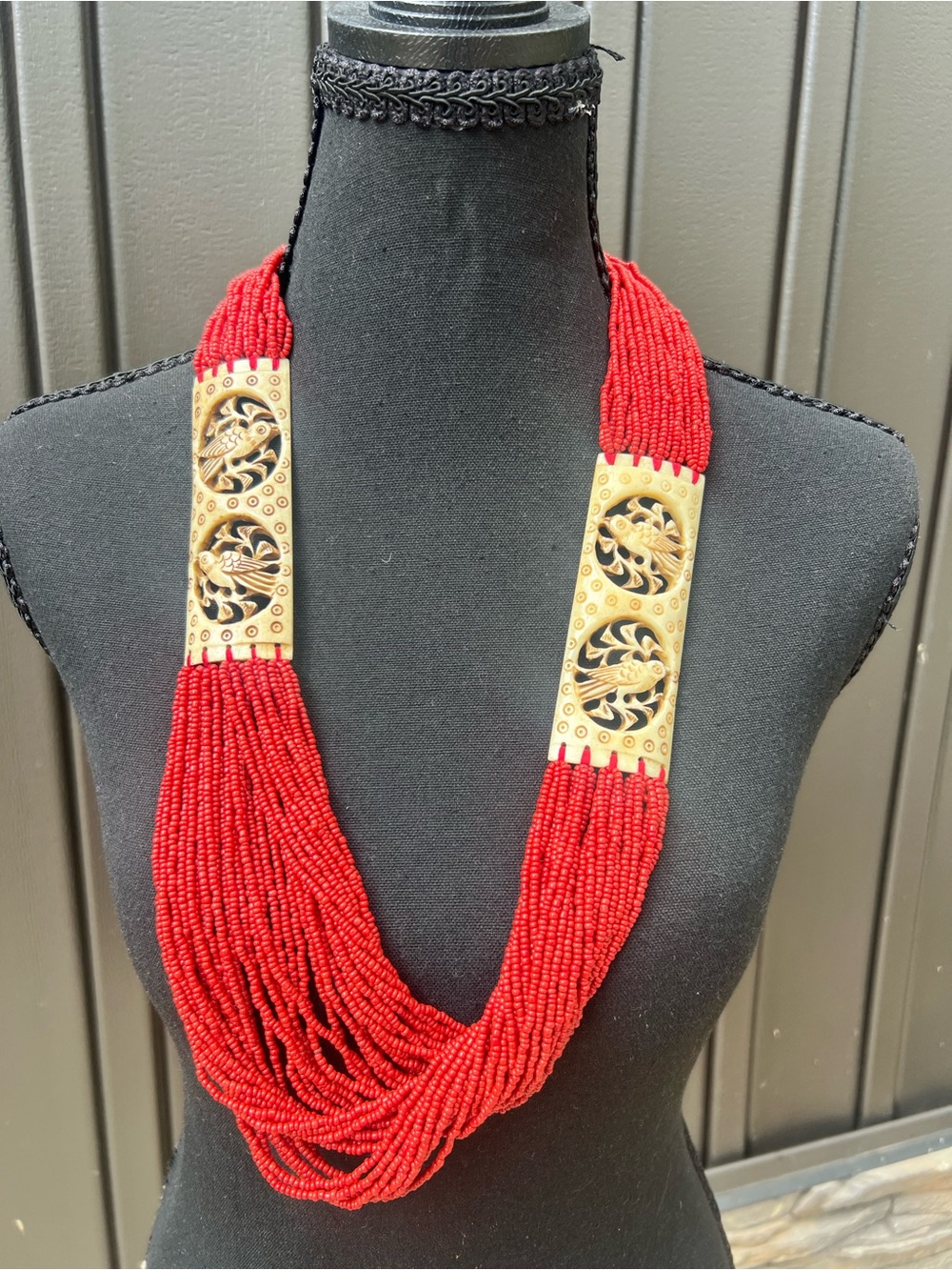 Red Multi-Strand Beaded Necklace with Gold Carved Panels